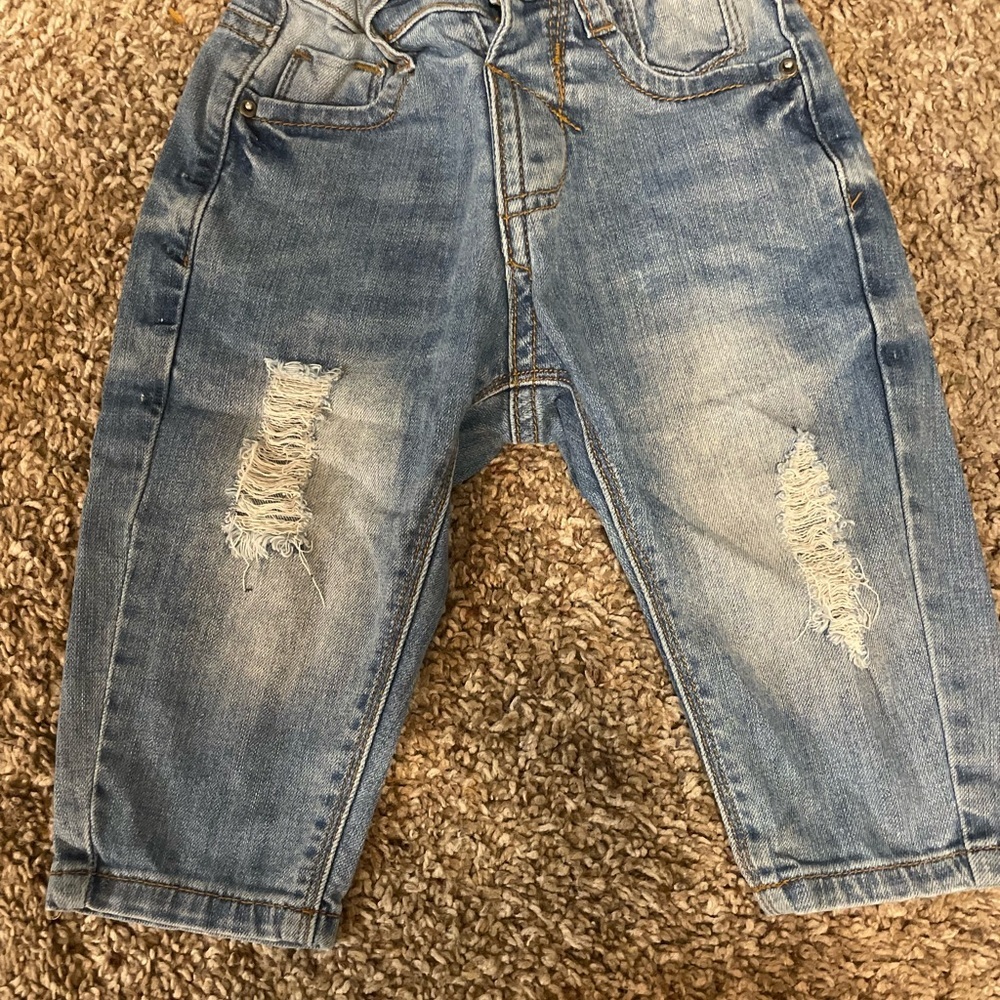 Distressed Blue Denim Jeans
